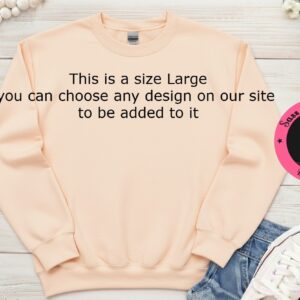 Large peach/cream sweatshirt